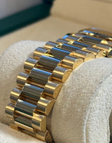 Rolex - Pre-owned Yellow Gold Day-Date 40 Presidential Champagne Index Dial 228238