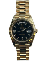 Rolex - Pre-owned Yellow Gold Day-Date 40 Presidential Black Baguette Dial 228238