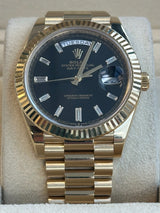 Rolex - Pre-owned Yellow Gold Day-Date 40 Presidential Black Baguette Dial 228238