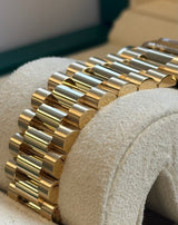Rolex - Pre-owned Yellow Gold Day-Date 40 Presidential Black Baguette Dial 228238
