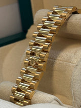 Rolex - Pre-owned Yellow Gold Day-Date 40 Presidential Black Baguette Dial 228238