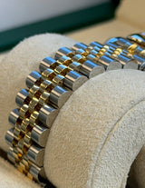 Rolex - Pre-owned Two Tone Yellow Gold Datejust 31 White Roman Dial Jubilee Bracelet 278243