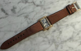 Cartier - Pre-owned Yellow Gold Tank Divan 32 x 25mm Silver Dial Diamond Bezel WA301071