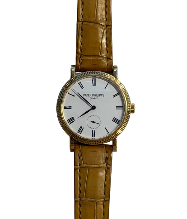 Patek Philippe - Pre-owned Yellow Gold Calatrava White Dial 7119J