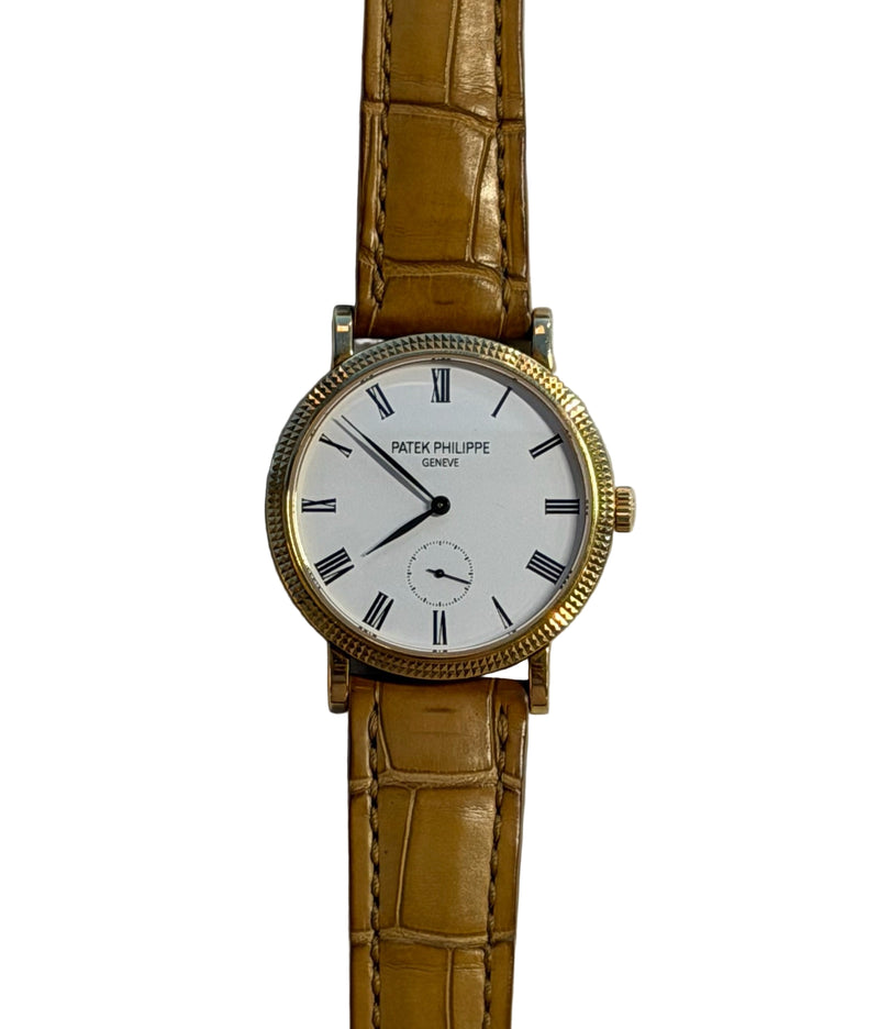 Patek Philippe - Pre-owned Yellow Gold Calatrava White Dial 7119J