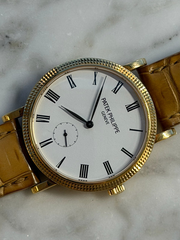 Patek Philippe - Pre-owned Yellow Gold Calatrava White Dial 7119J