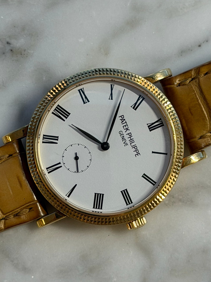Patek Philippe - Pre-owned Yellow Gold Calatrava White Dial 7119J