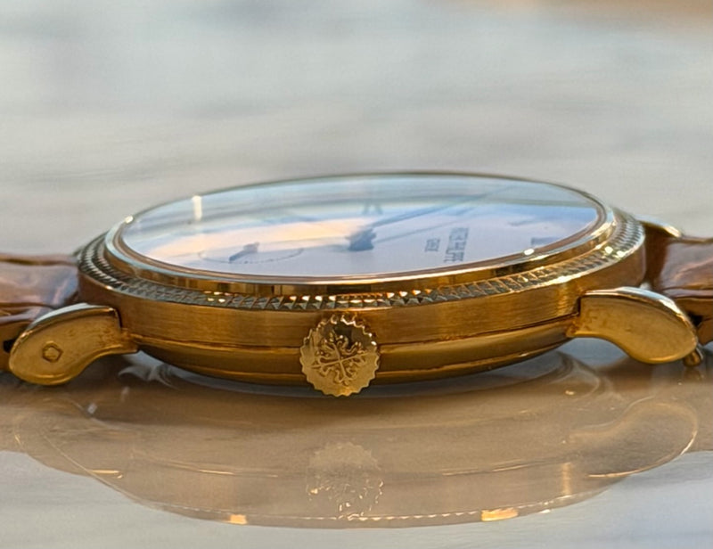 Patek Philippe - Pre-owned Yellow Gold Calatrava White Dial 7119J