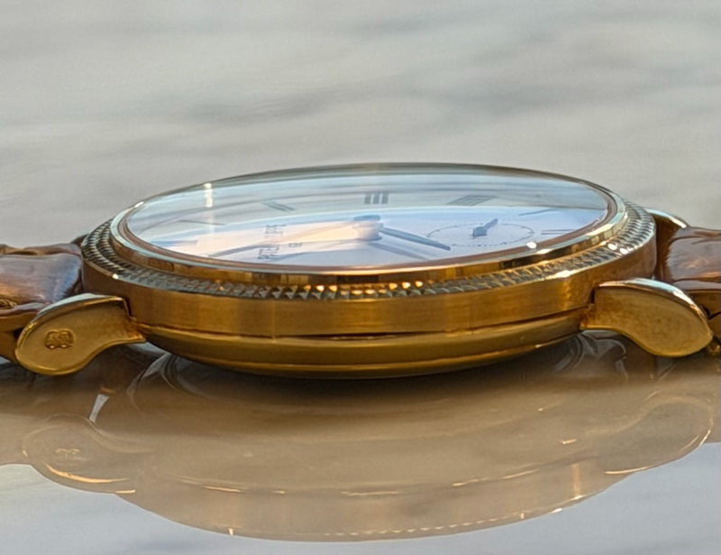 Patek Philippe - Pre-owned Yellow Gold Calatrava White Dial 7119J