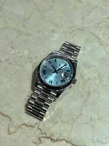 Rolex - Pre-owned Platinum Day-Date Presidential Ice Blue Roman Dial 228206